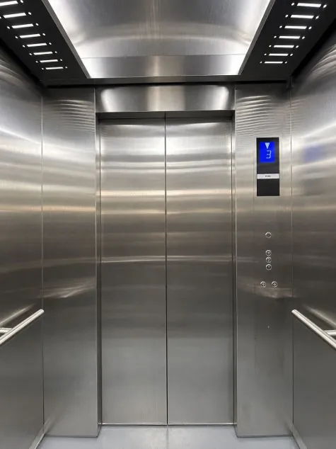 Cabin thang máy TEMI-CB1 vách inox sọc nhuyễn